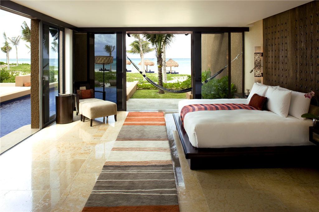 25557518-h1-btmxmy_sg_0609_3br_beach_front_pool_villa_masterbedroom_.jpg